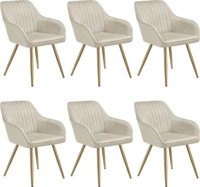 Six beige dining chairs with gold legs are arranged in two rows of three.