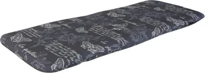 A long, padded ironing board cover with a butterfly and script pattern, shown at an angle on a white background.