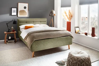Produktbild von Meise Möbel Stauraumbett Lotte 140x200 cm | Bettkasten & Lattenrost | Webstoff Grün | Holzfuß eichefarbig