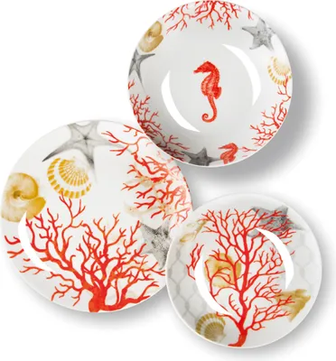 Three plates with a coral and sea life theme are arranged on a white background.