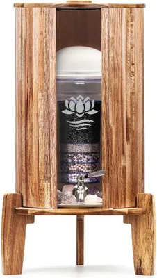A wooden water dispenser with a filter system inside.