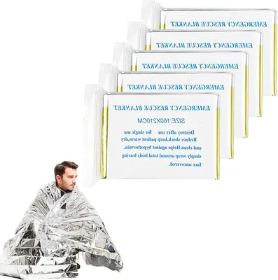 Immagine prodotto di Coperta termica di emergenza - Coperta termica in film plastico - Per situazioni di emergenza all'aperto - Resistente a strappi, impermeabile - 160 x 210 cm - Oro, argento