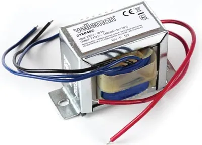 A Velleman open-chassis transformer is shown against a white background.