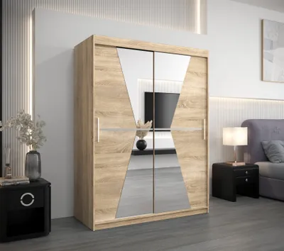 A bedroom setting with a wardrobe, nightstand, and bed.