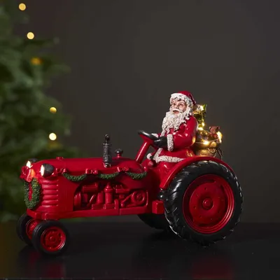 Zdjęcie produktu dla Scenka świąteczna św. Mikołaj na traktorze Led MERRYVILLE