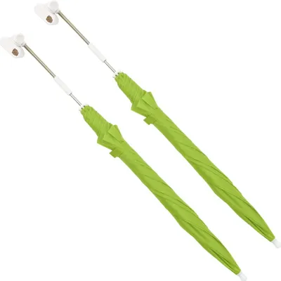 Two green camping chair umbrellas are shown diagonally against a white background.