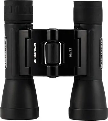 A product shot of a pair of black binoculars.