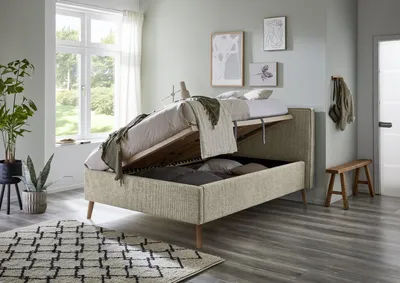 Produktbild von Meise Möbel Stauraumbett Riva 140x200 cm | Doppelbett | Bettkasten & Lattenrost (Federholzrahmen) | Webstoff Braun | Holzfuß eichefarbig