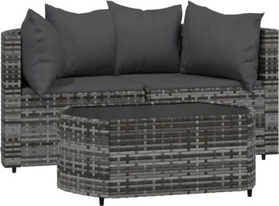 A three-piece outdoor lounge set with cushions and a coffee table, made of poly rattan.