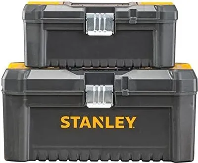 Two stacked black and yellow toolboxes with silver clasps.
