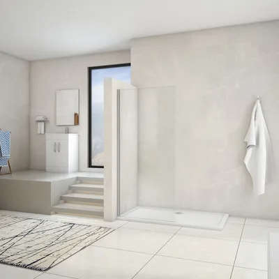 A modern bathroom with a walk-in shower, vanity, and a window with a view.