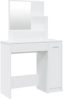 A white vanity table with a mirror and shelves.