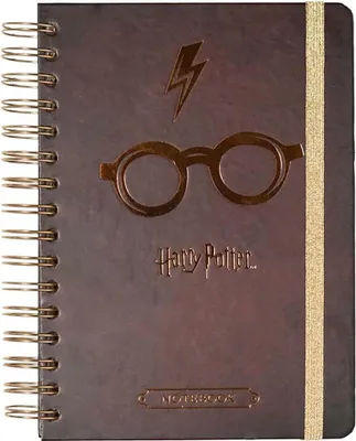 A close-up, front-facing view of a Harry Potter themed spiral notebook.