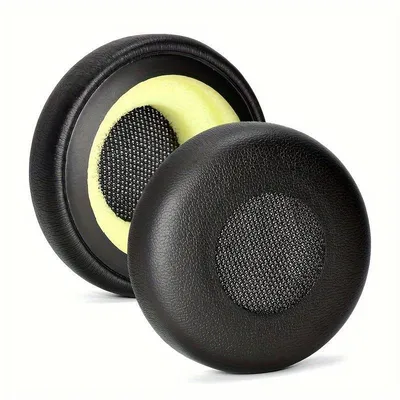 Two black ear pads for headphones are shown against a white background.