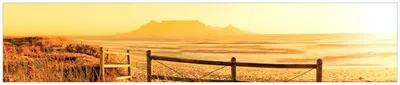 Produktbild von Wallario Küchenrückwand aus Glas, Größe: 250 x 50 cm, Motiv: Strand in Südafrika I - Himmel in orange | Spritzschutz | abwischbar | pflegeleicht | in