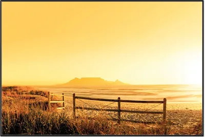 Produktbild von Wallario Wandbild Strand in Südafrika I - Himmel in orange, Größe: 61 x 91,50 cm, Poster mit schwarzem Aluminiumrahmen
