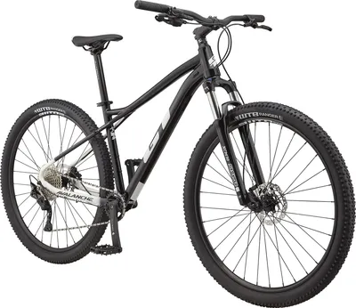 A black GT Avalanche Comp mountain bike is shown from a front-diagonal view against a white background.