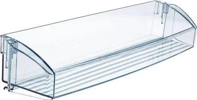A clear plastic shelf from a refrigerator.