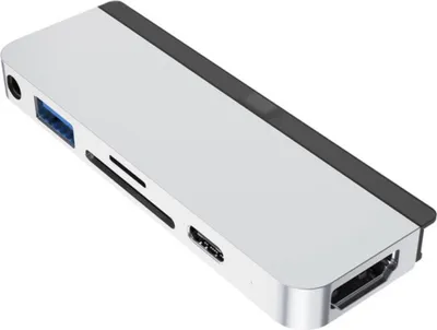 A silver USB-C hub with multiple ports, shown from a diagonal angle on a white background.