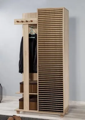 A tall, narrow wardrobe with a slatted door and an open section with coat hooks and shelves, set against a light gray wall.