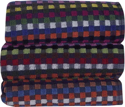 Three folded towels stacked on top of each other.