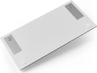 The back of a white rectangular glass picture frame with metal mounting brackets and small white pads on the corners.