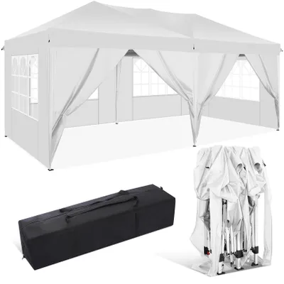 A white pop-up tent with side panels and windows, shown with its folded frame and a carrying bag.