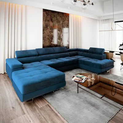A modern living room with a large blue sectional sofa.