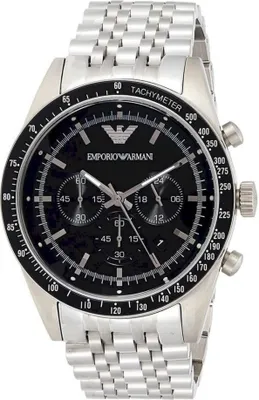 A close-up studio shot of an Emporio Armani chronograph watch with a black dial and silver metal band.