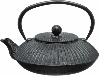 A black cast iron teapot with a handle and lid, isolated on a white background.