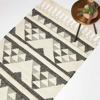 Produktbild von HOMESCAPES Handgewebter Kelim Teppich Kota – 120 x 170 cm, schwarz-grau-creme gemustert
