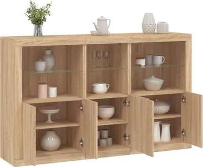 A wooden sideboard with glass shelves and doors, displaying various decorative items and kitchenware.