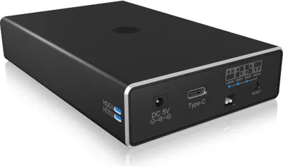 A black external hard drive enclosure with silver trim, shown from a diagonal angle on a white background.