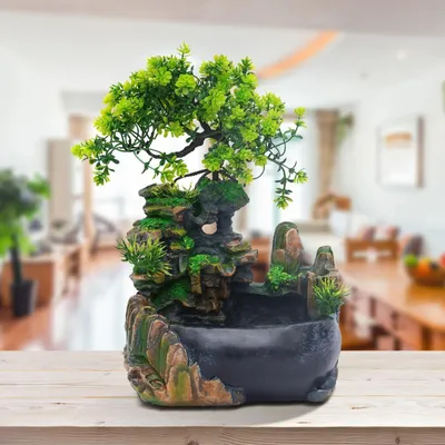 Produktbild von Zimmerbrunnen Wasserfall - Tischbrunnen - Klein und kompakt - Pflanzenbrunnen - Für Wohnzimmer, Büro, Café - Kunstharz - Grün