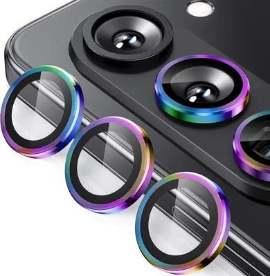 A close-up shot of colorful camera lens protectors for a smartphone.