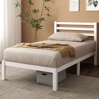 Modernes weißes Bettgestell mit Stauraum – stilvolle Einrichtung in einem hellen Schlafzimmer.