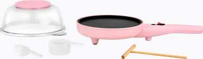 A pink electric crepe maker and its accessories are displayed on a white background.
