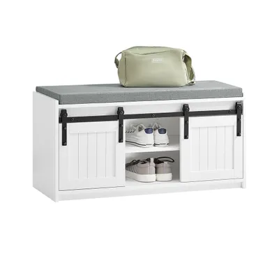 A white shoe bench with a gray seat cushion and a light green bag on top, set against a white background.