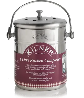A stainless steel kitchen composter with a burgundy label.