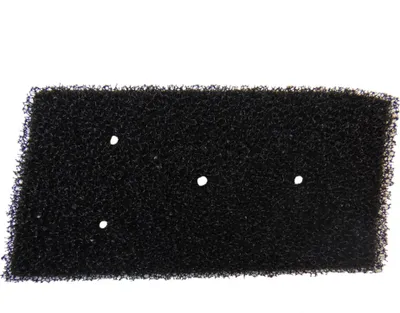 A black foam filter with four small white dots is shown against a white background.