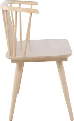 A side view of a light-colored wooden chair.