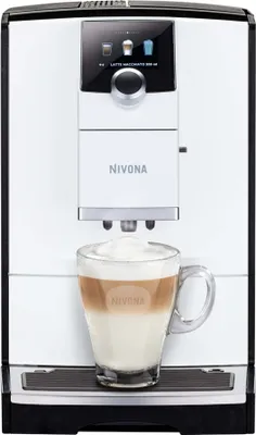 A white and chrome automatic coffee machine with a glass mug of latte macchiato underneath the spout.