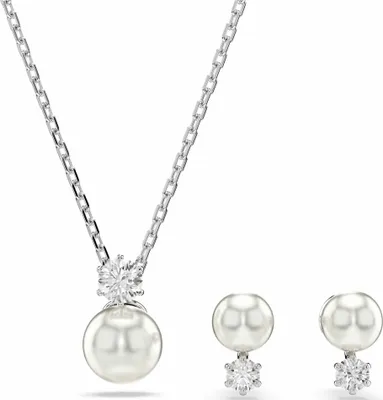 A jewelry set consisting of a necklace and earrings, featuring pearls and clear stones, displayed against a white background.