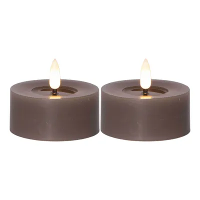 Two LED candles with a flame effect, placed side-by-side on a white background.