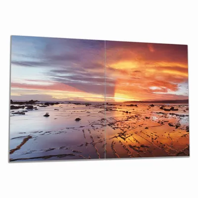 Produktbild von Wallario Herdabdeckplatte aus Glas, Größe 80 x 52 cm 2-teilig, Motiv Wattwanderung am Meer bei Sonnenuntergang