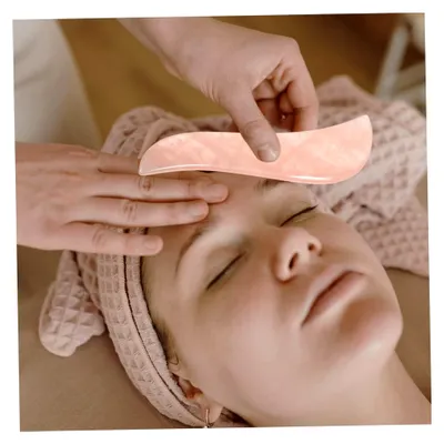Produktbild von Jadestein Massagegerät in S-Form für Gesicht und Körper
