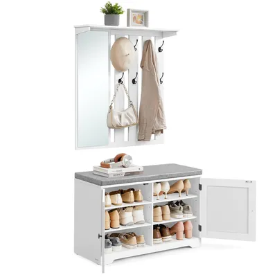 A white entryway organizer set including a wall-mounted coat rack with a mirror and a shoe bench with storage.