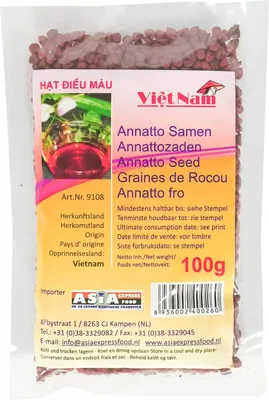 A package of Annatto seeds with product information and branding.
