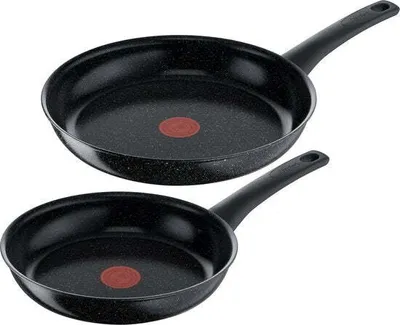 Two black frying pans with red heat indicators are shown against a white background.