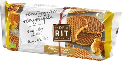 Produktbild von De Rit Honigwaffeln, Wafer Keks, Honig, WEIZENSIRUP (35%), WEIZENMEHL, Palmöl, Maismalzsirup (12%), Honig (8%), WEIZENKLEIE, SOJAMEHL,..., 451 kcal, 1898 kJ, 3,7 g